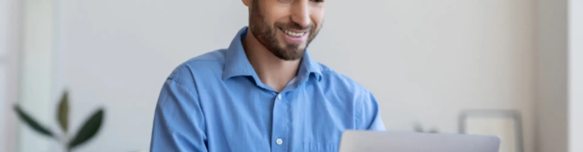 man working at a laptop