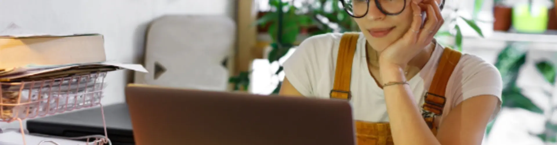 woman reading a laptop