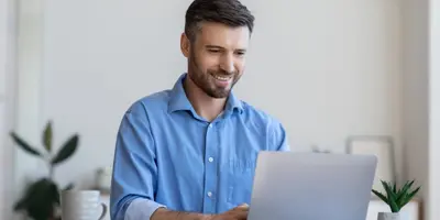 man working at a laptop