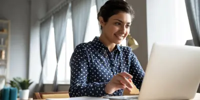 woman working at a laptop